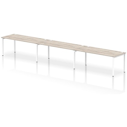 Impulse 3 Person Bench Desk, Side by Side, 3 x 1800mm (800mm Deep), White Frame, Grey Oak
